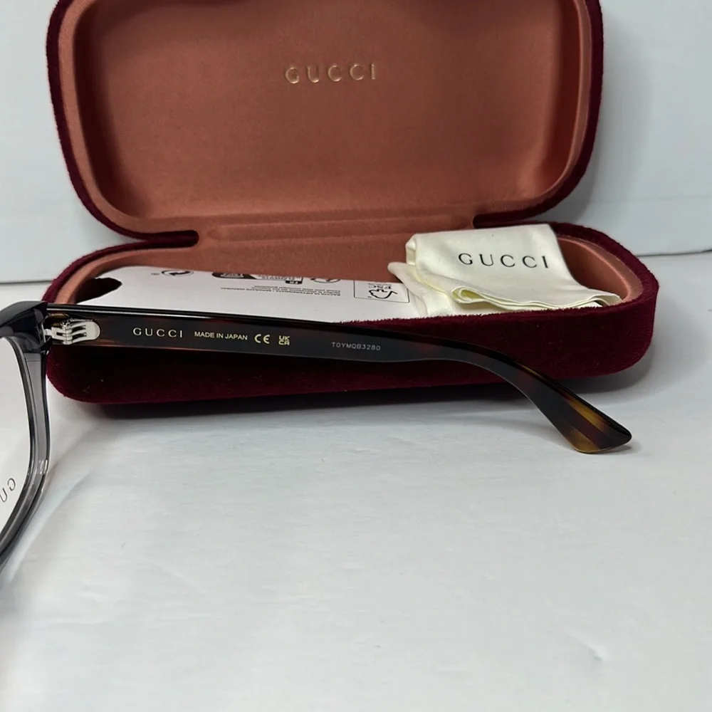 New- Auth - Gucci's GG0004ON soft lines across frames front.Iconic web effect…